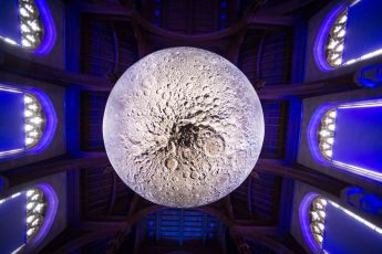 Artist Luke Jerram with his installation, Museum of the Moon, in the University of Bristol Great Hall, Wills Memorial Building, Bristol. Measuring seven metres in diameter, Luke’s Moon features detailed NASA imagery of the lunar surface. Each centimetre on his moon represents 5km on the surface of the Earth's largest natural satellite. The installation in the Great Hall is part of the Moon’s international tour in which it is presented in different ways, both indoors and outdoors, altering the experience of the artwork for different audiences worldwide.
19/03/2017
Photo by Simon Galloway
Photo must carry Photographer byline;
©Simon Galloway 2016. All Rights Reserved.
NO SYNDICATION/NO RESALE/NO PRINT SALES/NO WEB USE WITHOUT NEGOTIATION/NO ADVERTISING USE. Simon Galloway asserts his Moral Rights as the author of this work in accordance with the Copyright Designs and Patents Act 1988.
Contact photographer: Simon Galloway
07810 638162 simongalloway@hotmail.com
www.simongallowayphotography.co.uk
